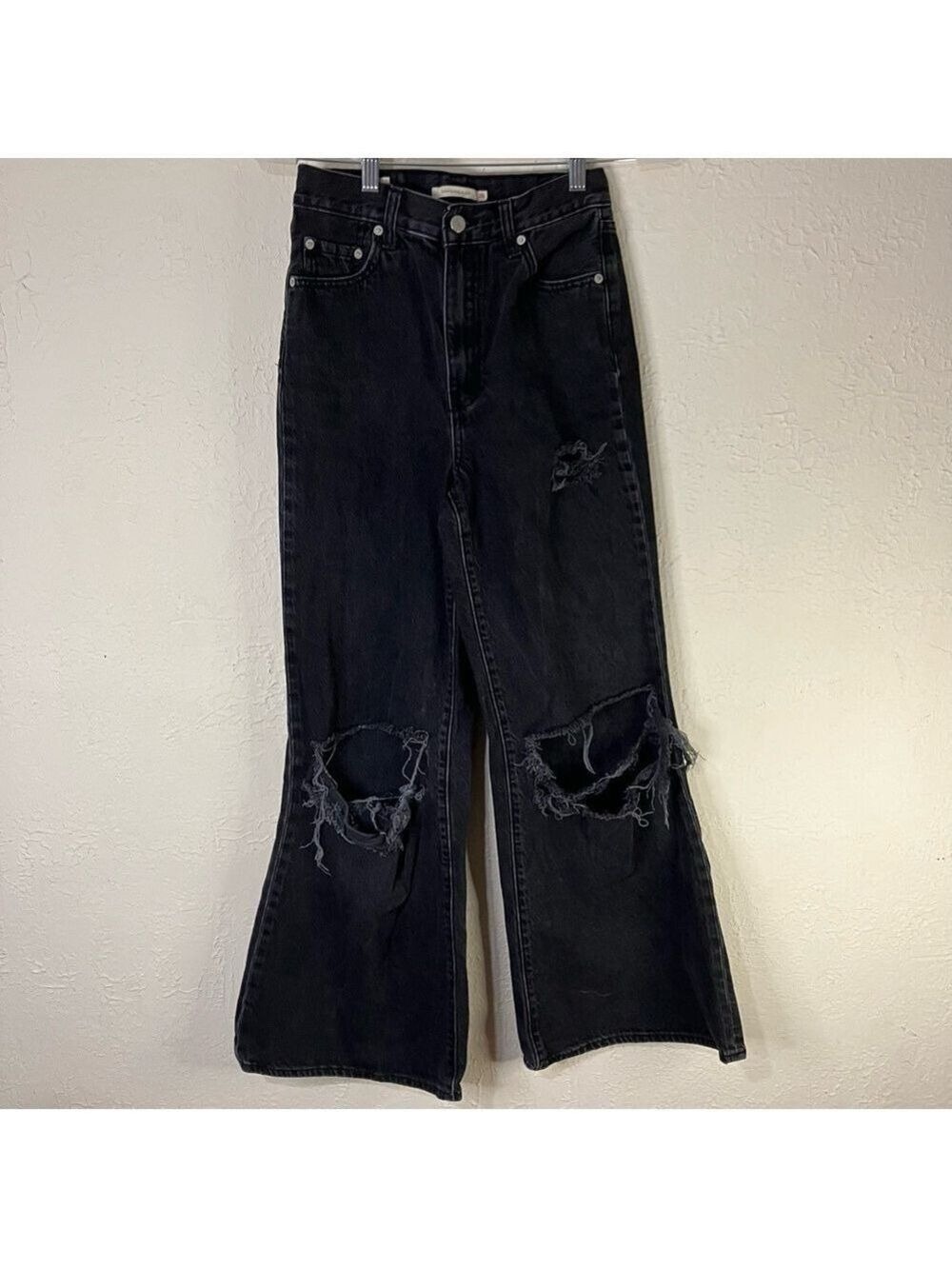 Levi’s Distressed High Waisted Loose Flare Jeans in Washed Black